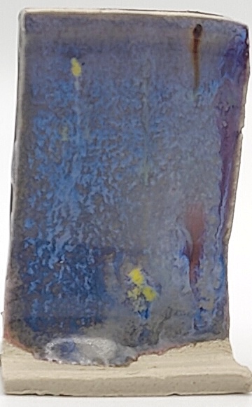 Amaryllis + Nimbus on Valentine Earthstone ES-10 cone 6 oxidation
