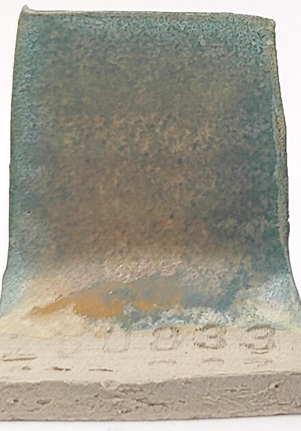 Riptide + Fossil Rock on Valentine Earthstone ES-10 cone 6 oxidation