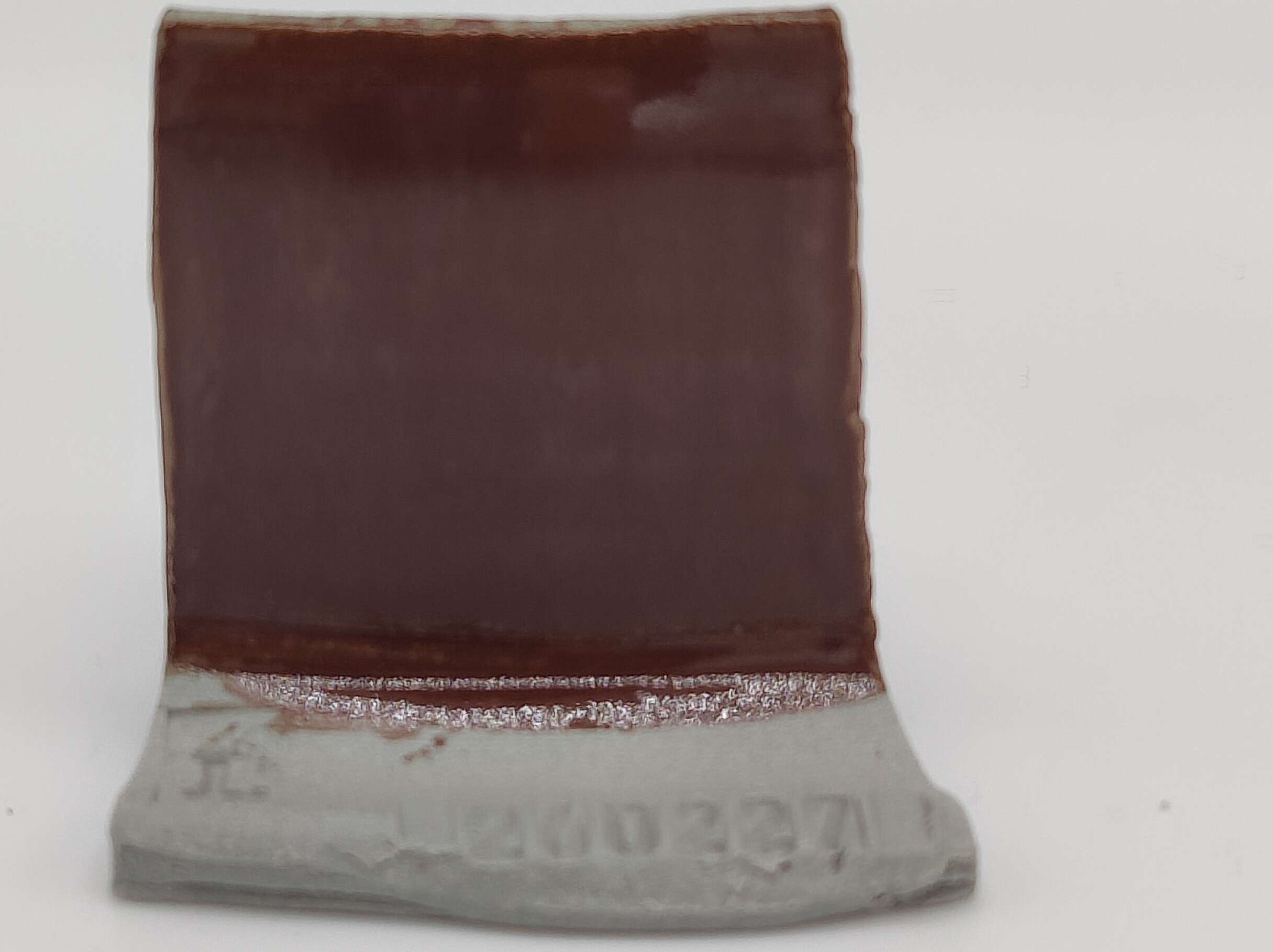 Brown Gloss + SPS - Melting Point Reducer on Valentine LoStone Sea-Mist cone 5 oxidation