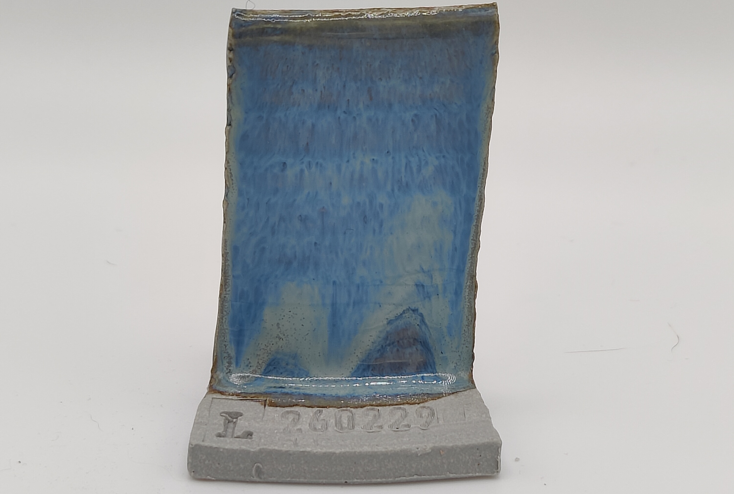 Blue Rutile + SPS - Melting Point Reducer on Valentine LoStone Sea-Mist cone 5 oxidation