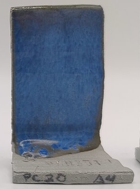 Blue Rutile + SPS - Melting Point Reducer on Valentine LoStone Sea-Mist cone 4 oxidation