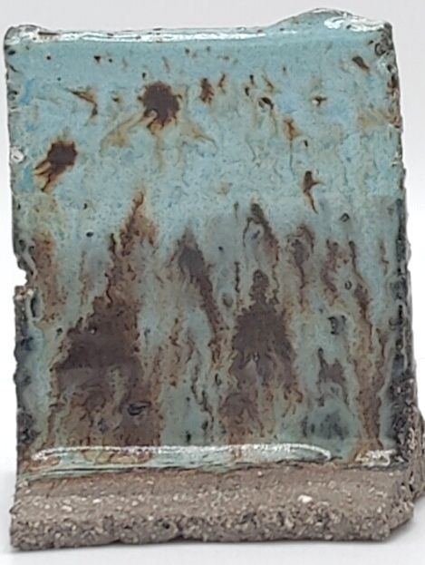 White Engobe + Black Engobe + Cenote on SIO2 Barcino Grey cone 6 oxidation