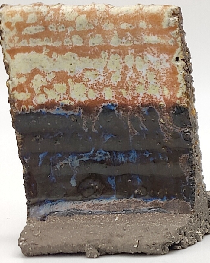 White Engobe + Black Engobe + Sand Dollar on SIO2 Barcino Grey cone 6 oxidation