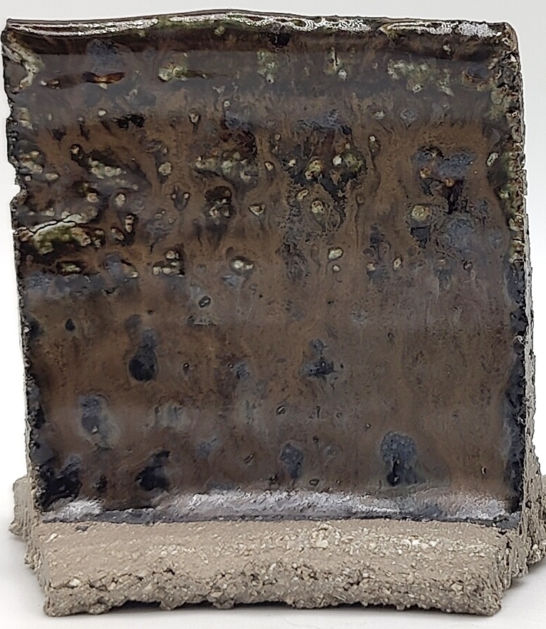 White Engobe + Black Engobe + Black Timber on SIO2 Barcino Grey cone 6 oxidation