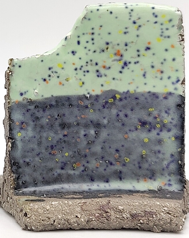White Engobe + Black Engobe + Mint Speck on SIO2 Barcino Grey cone 6 oxidation