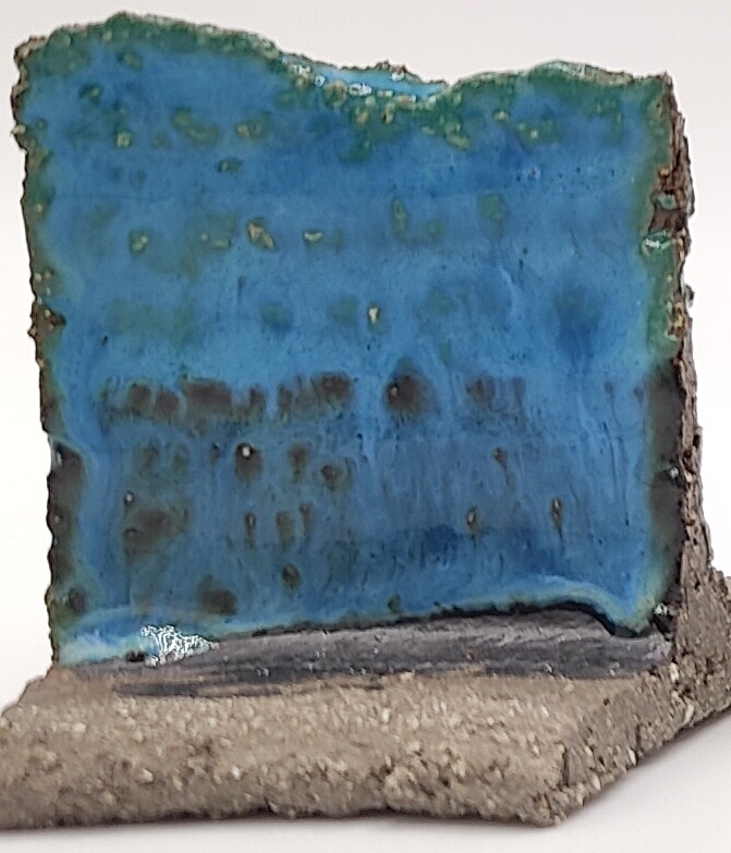 White Engobe + Black Engobe + Tropical Teal on SIO2 Barcino Grey cone 6 oxidation