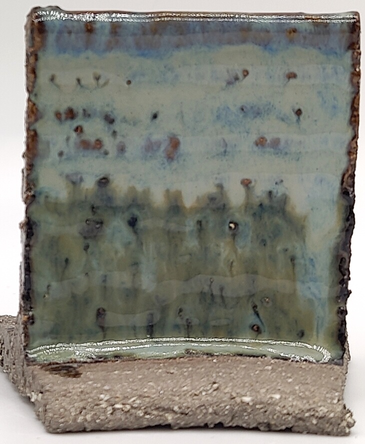 White Engobe + Black Engobe + Blue Rutile on SIO2 Barcino Grey cone 6 oxidation