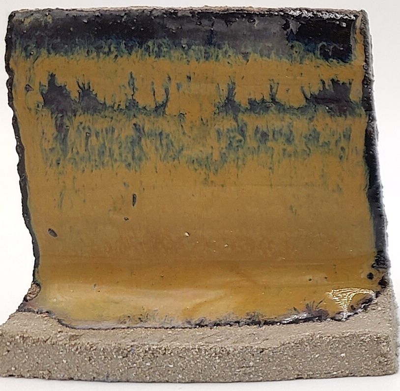 Tiger's Eye on SIO2 Zumaia Grey (Rokk Grey) cone 6 oxidation