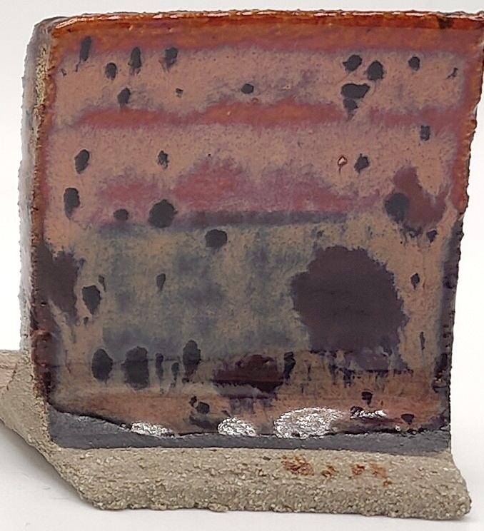 White Engobe + Black Engobe + Peppered Plum on SIO2 Zumaia Grey (Rokk Grey) cone 6 oxidation