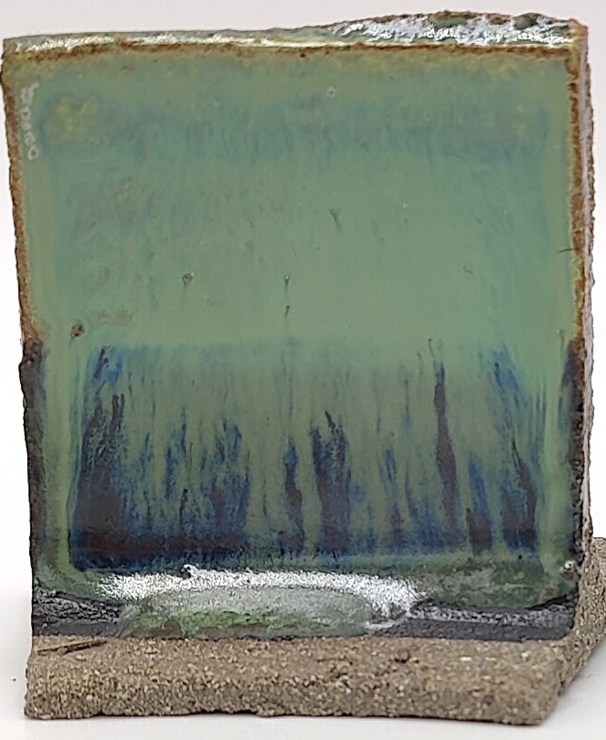 White Engobe + Black Engobe + Ivy on SIO2 Zumaia Grey (Rokk Grey) cone 6 oxidation