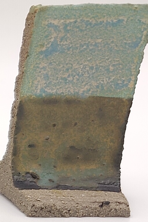 White Engobe + Black Engobe + Riptide on SIO2 Zumaia Grey (Rokk Grey) cone 6 oxidation