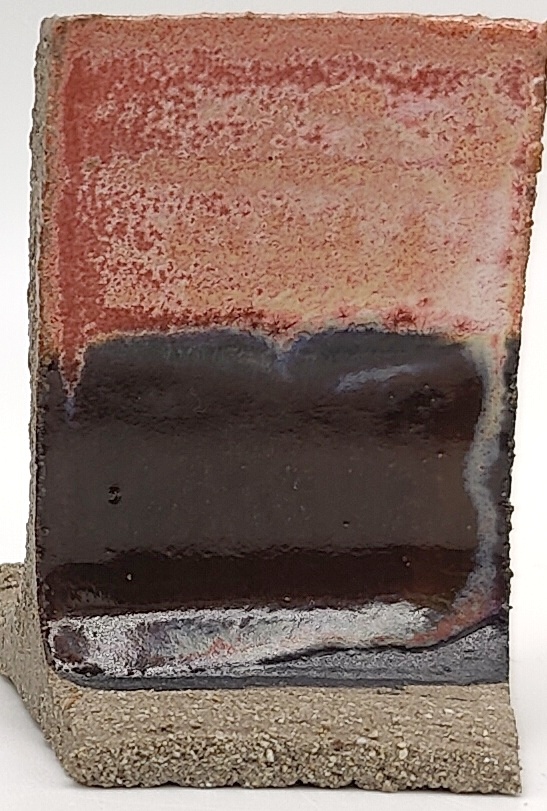 White Engobe + Black Engobe + Rose Quartz on SIO2 Zumaia Grey (Rokk Grey) cone 6 oxidation