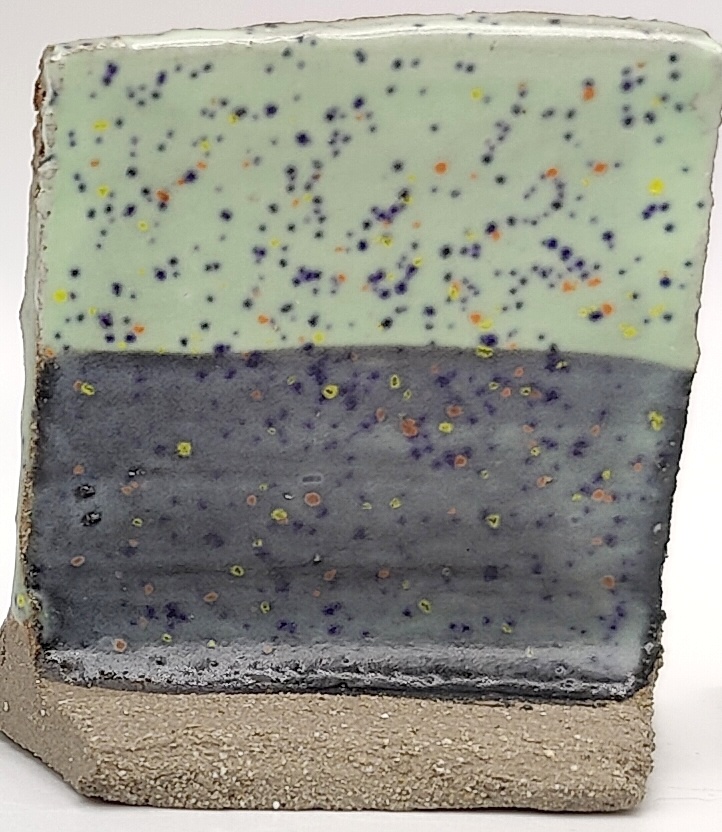 White Engobe + Black Engobe + Mint Speck on SIO2 Zumaia Grey (Rokk Grey) cone 6 oxidation