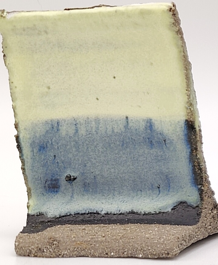 White Engobe + Black Engobe + Lemon Drop on SIO2 Zumaia Grey (Rokk Grey) cone 6 oxidation