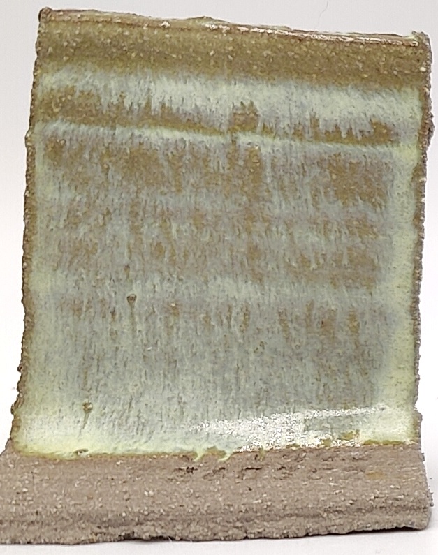 Lemon Drop on SIO2 Zumaia Grey (Rokk Grey) cone 6 oxidation