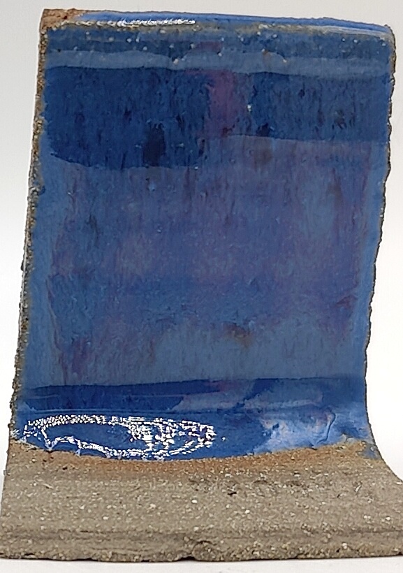 Dragon's Eye on SIO2 Zumaia Grey (Rokk Grey) cone 6 oxidation