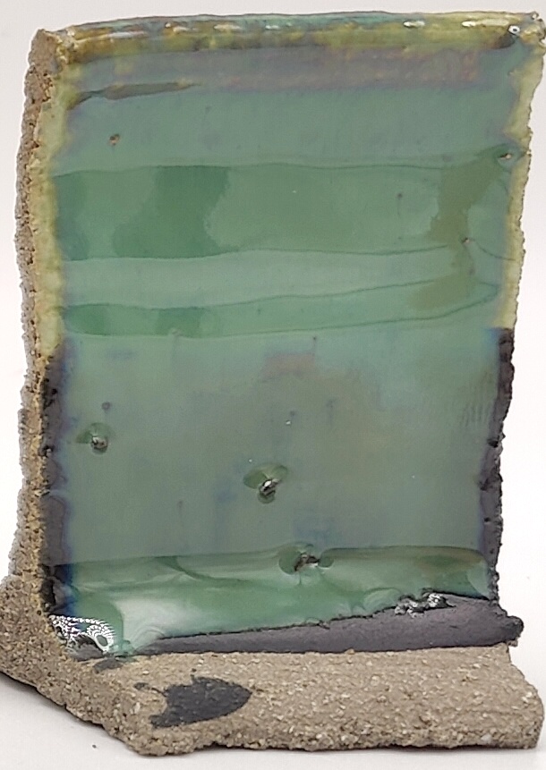 White Engobe + Black Engobe + Prisma Green on SIO2 Zumaia Grey (Rokk Grey) cone 6 oxidation