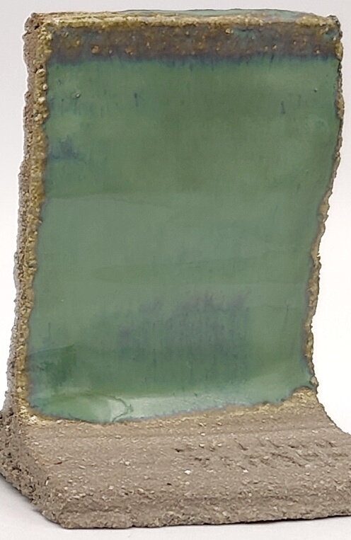 Prisma Green on SIO2 Zumaia Grey (Rokk Grey) cone 6 oxidation